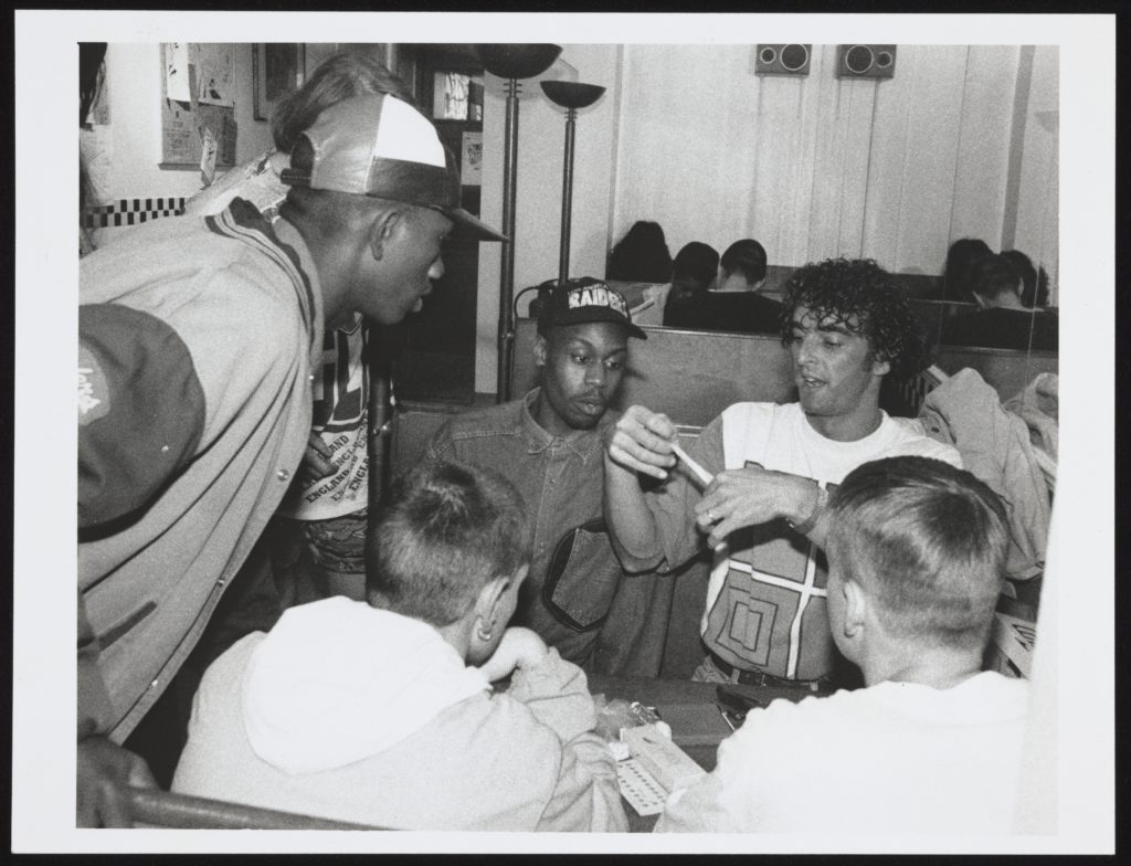 Group of young men at a sex education session, 1990s