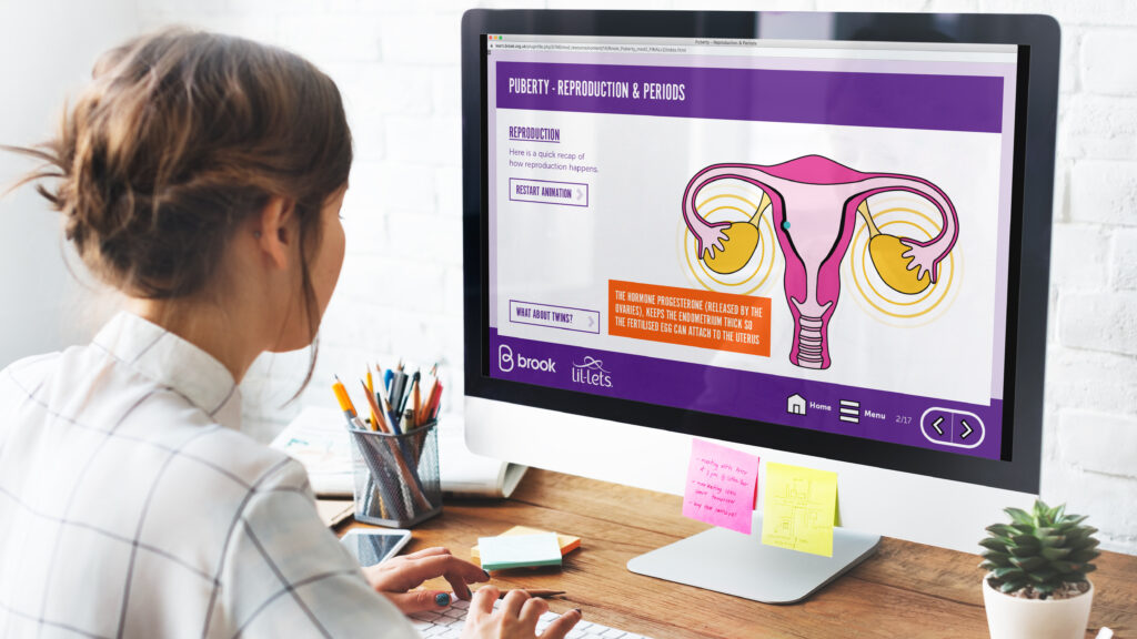 person looking at a computer creen with a slide from Brook Learn's puberty course