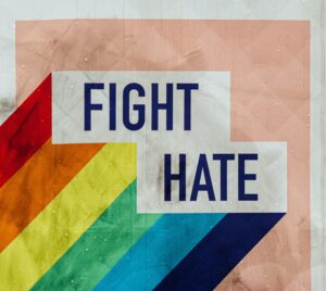 Rainbow background with Fight Hate in big writing