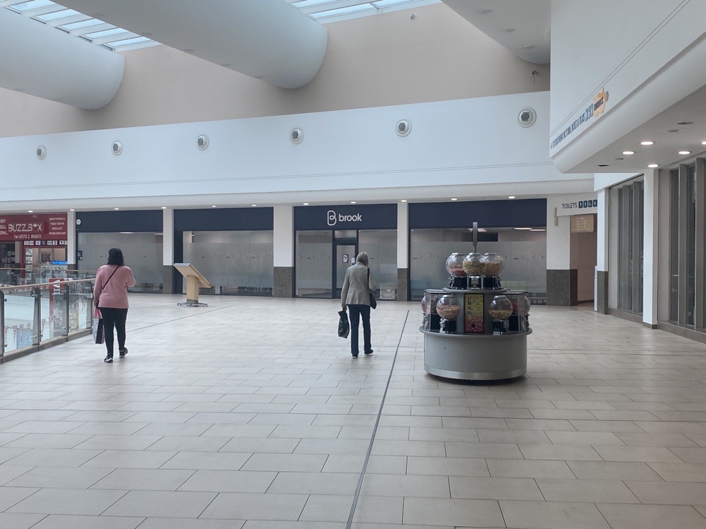 Brook Southend on the first floor of Victoria shopping centre with purple Brook logos and frosted windows.