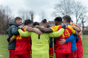 Group of footballers grouped together