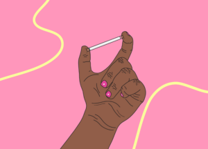 Hand holding implant (small rod) between thumb and first finger