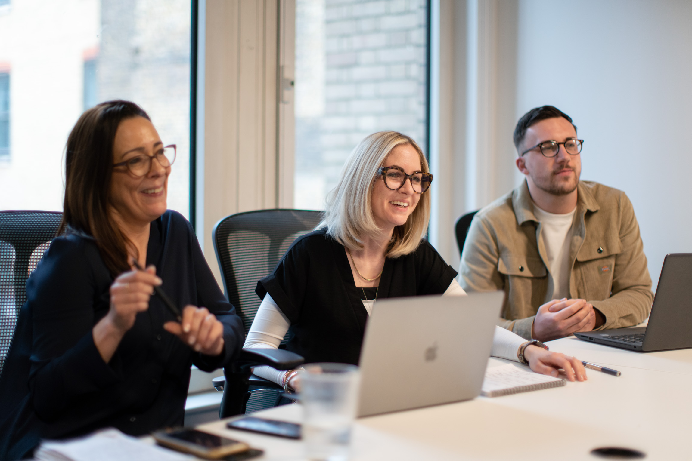 Three members of staff at a menopause training session
