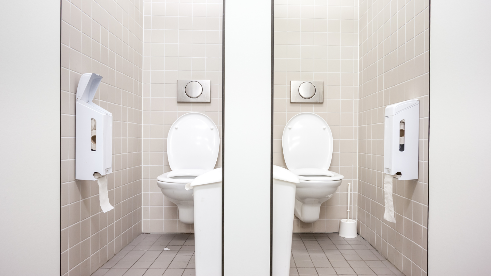 Two white toilet cubicles