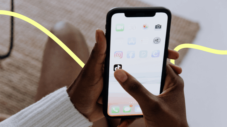 Someone on their phone about to click on the TikTok app.