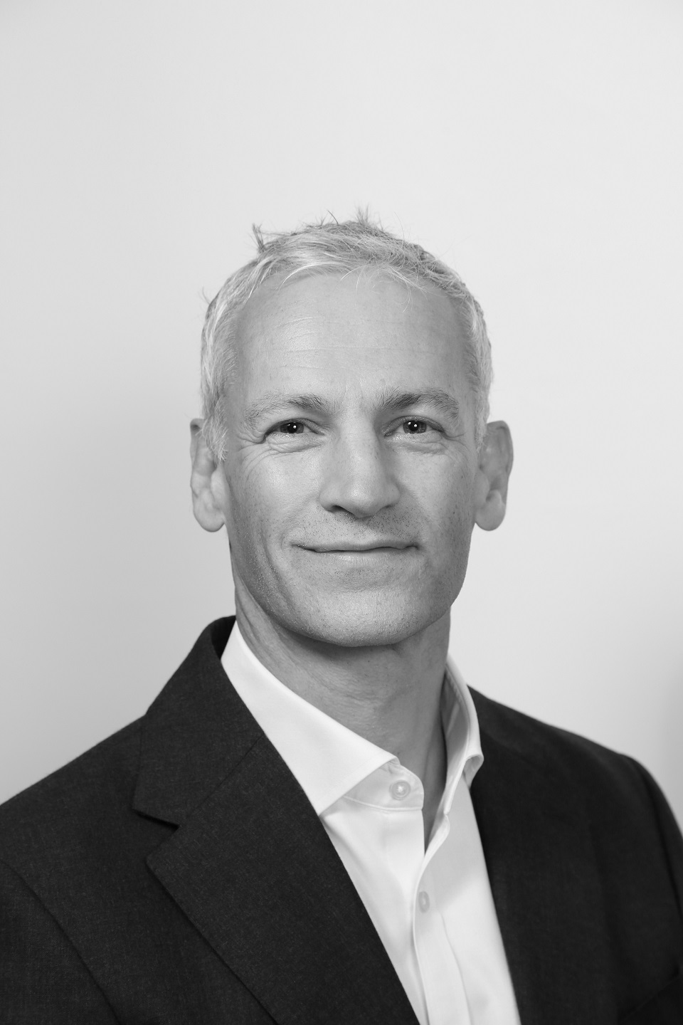 Black and white professional photo of Mark Bickford