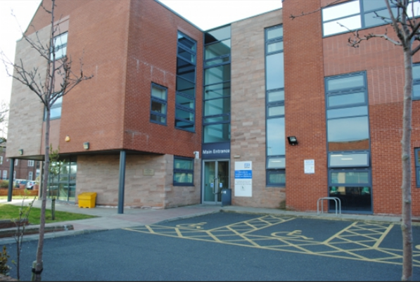 Southport centre for health and wellbeing entrance. Red brick building