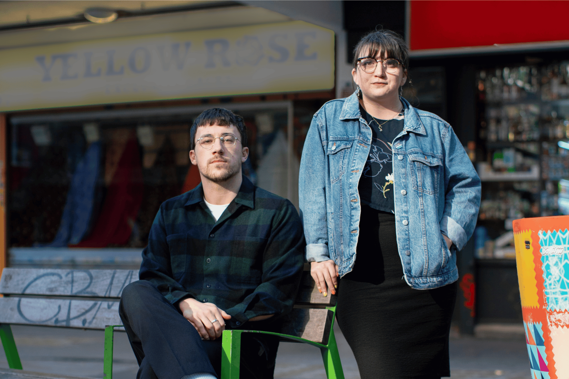 Two brook staff standing on a London street