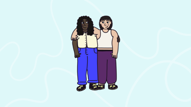 Two people with their arms around each other