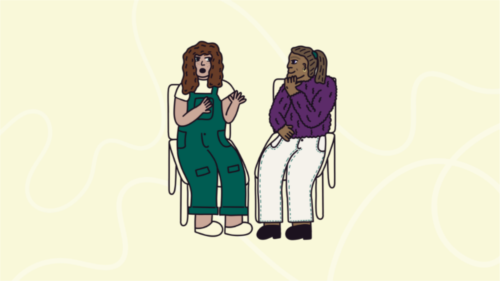 Two people sat having a chat