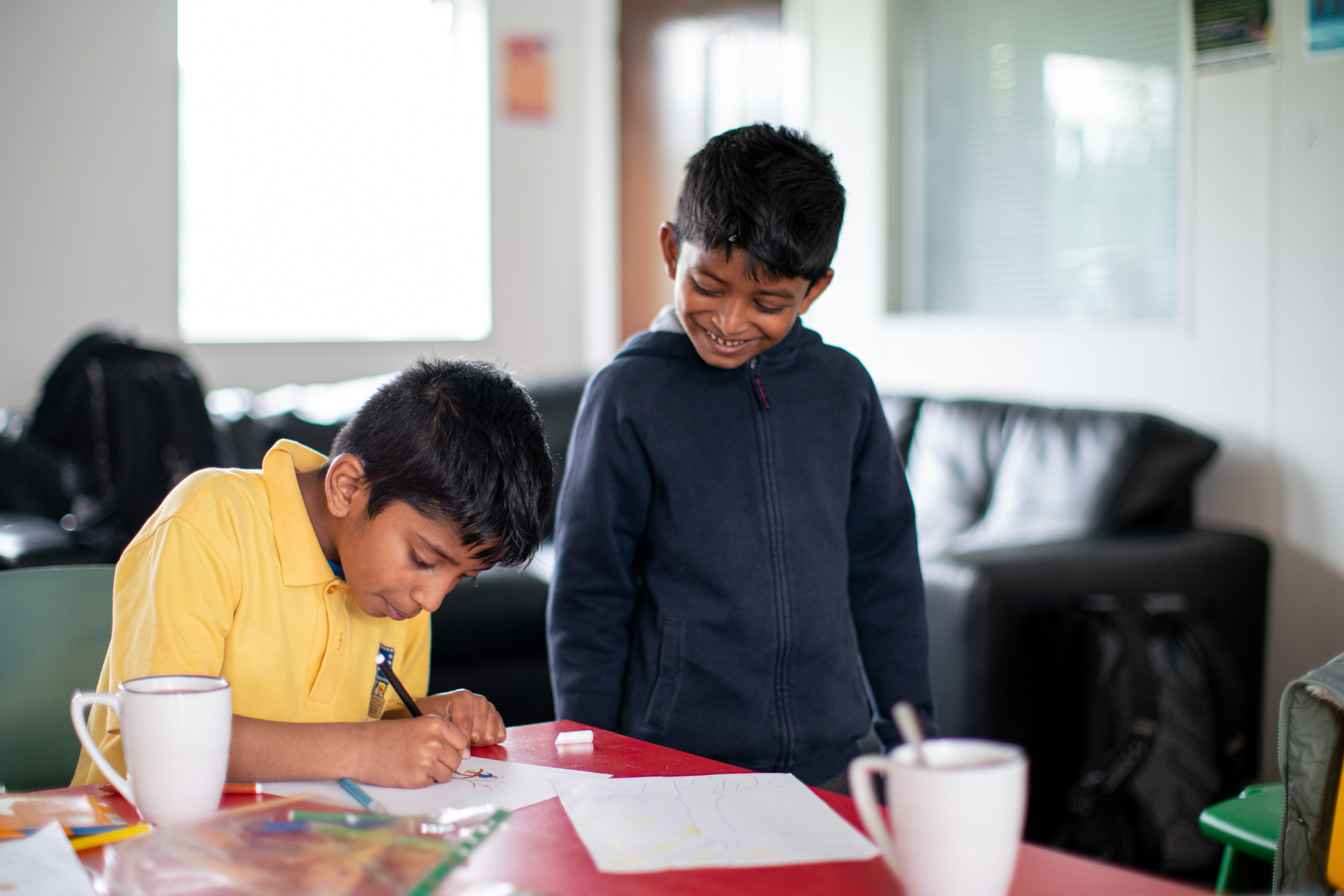 two children at a school table